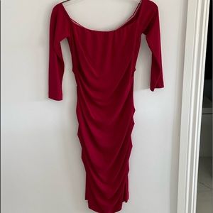 Red off the the shoulder dress by Nicole Miller.